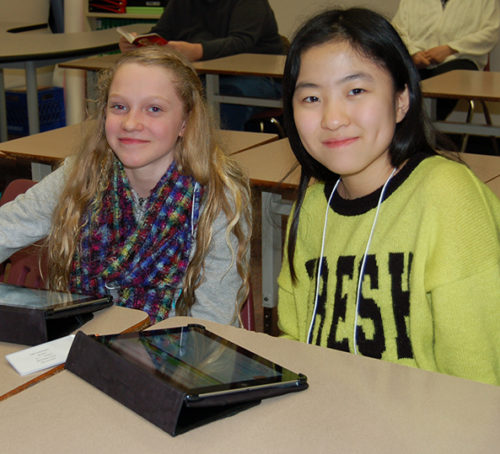 Students working on an iPad